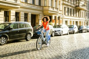 4 ways you can change your relationship with exercise woman on bike