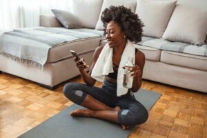 Could a ‘Sunday Reset’ be the key to a happier and healthier life woman exercising at home