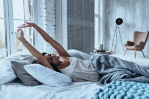 chronic pain woman well rested after sleep