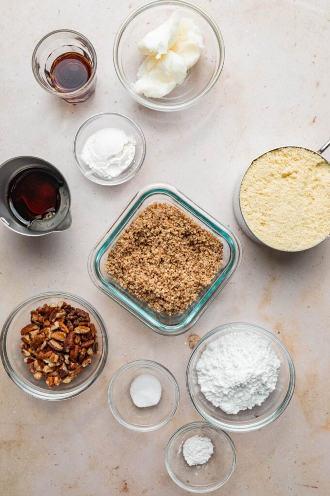 pecan snowball cookie ingredients in glass bowls