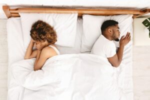 COUPLE sleeping during argument sleep hacks too stressed to sleep
