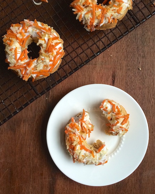 Carrots and coconut are a magical and nutritious combination in this fiber rich baked donut recipe. teaspoonofspice.com @tspbasil