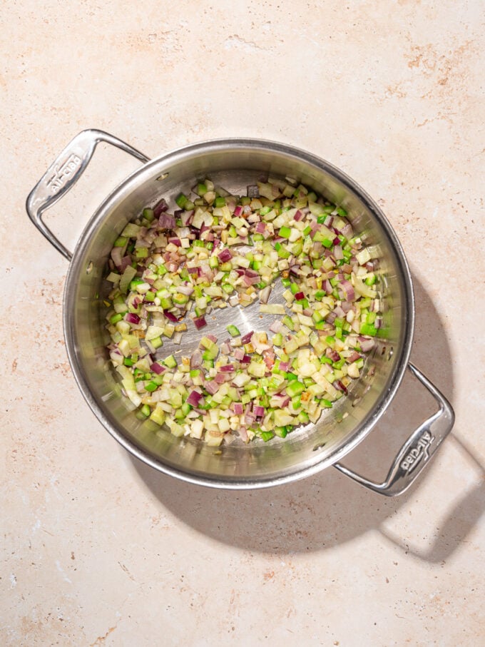 cooked celery, onion, fennel in pot